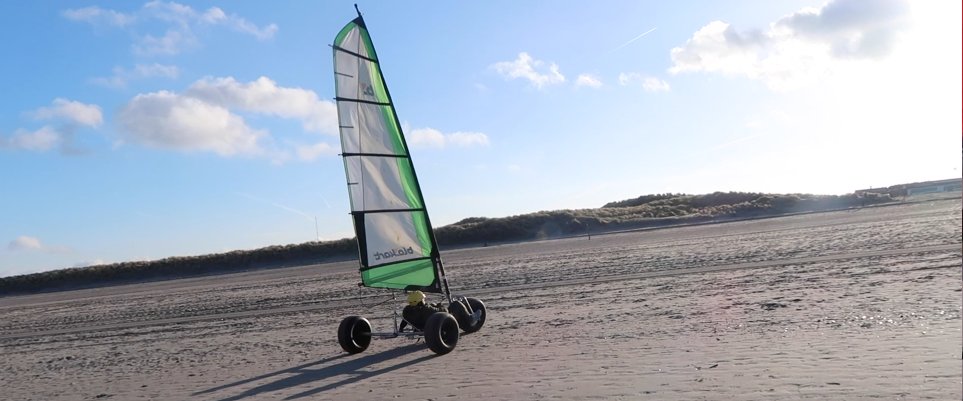 Musa op het strand aan het blokarten